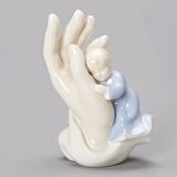 4.5" boy palm of hand figure valencia collection. 4.38"H x 3"W x 2.25"D Porcelain. Gift Box.