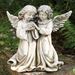 Angels with Bird Statue