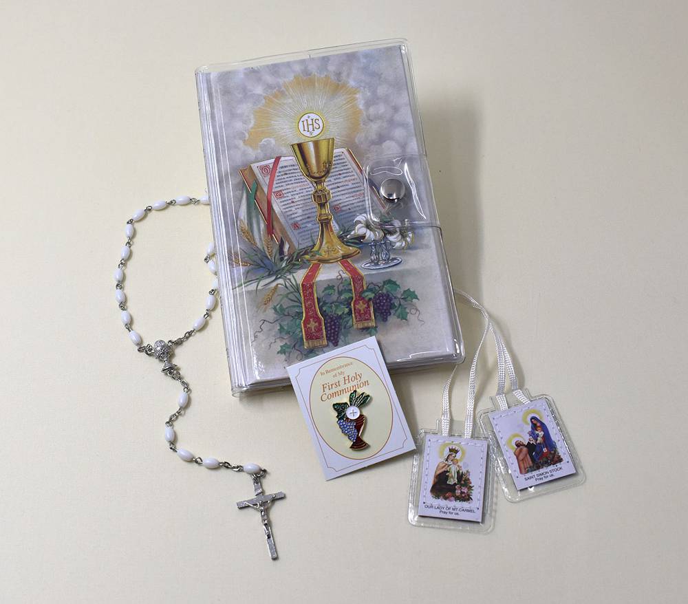 First Mass Book (Pray Always Edition) Vinyl Set White Each Vinyl Wallet Set contains a Pray Always Edition First Mass Book with gilded edges, laminated scapular, enamel pin, chain rosary, and a clear wallet holder. Girl Edition.
