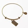 Gold Bangle with Blessed Charm
