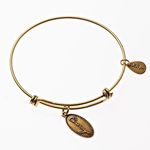 Gold Bangle with Courage Charm