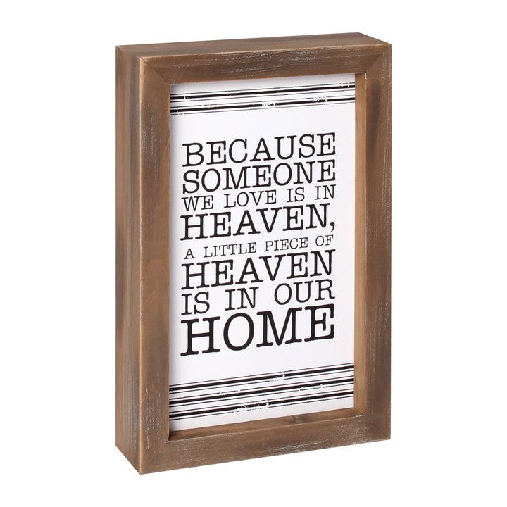 BECAUSE SOMEONE WE LOVE IS IN HEAVEN, A LITTLE PIECE OF HEAVEN IS IN OUR HOME  Wood Framed Sign, White Background with Black Stripes, Black Text