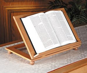 Adjustable bible stand offers hand crafted stand that can adjust to five height levels. Material: Maple?  Size: 15-5/8" W x 10-5/8" D Top, 1"H Ledge  Pecan Stain
